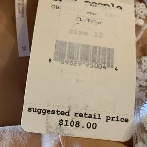 White Spaghetti strap floral sequins mini dress.